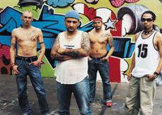 Photograph of four gang members.
