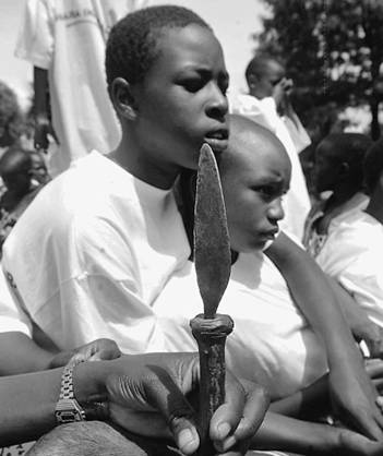 Two Kenyan girls sit near a knife used for female genital mutilation in Nyamira, west of Nairobi. There are good reasons within the society for the operation to continue, but these are cultural reasons. They are not scientific ones, says Janice Boddy, a University of Toronto professor.