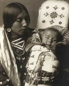 http://1onewolf.com/lakota/Images/Genocide/native-american-indian-crow-woman-and-baby-1908.jpg